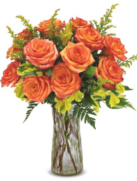 12 orange roses in clear vase