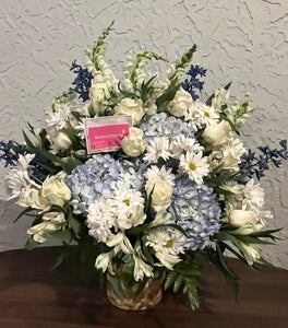 Blue and white sympathy basket