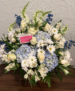 Blue and white sympathy basket