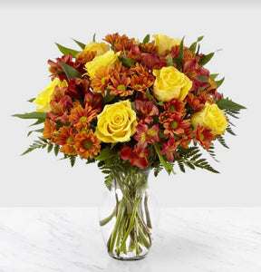 Golden Autumn Bouquet in clear vase