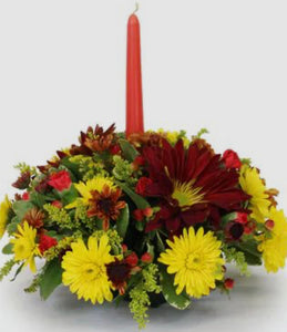 Gold Centerpiece with orange candle.