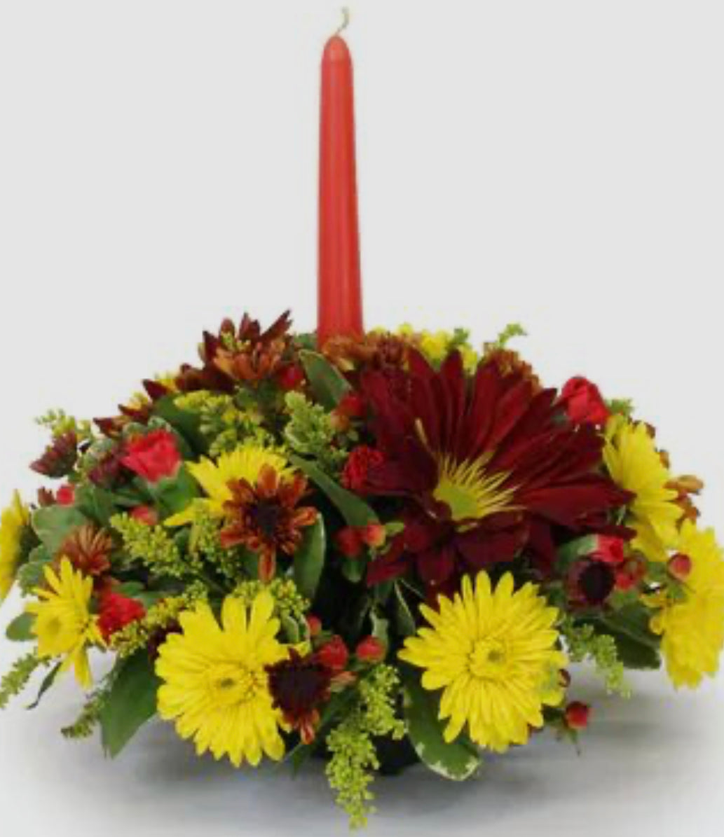 Gold Centerpiece with orange candle.